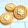 eggo waffle bath bomb with whipped cream and butter